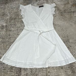 Pretty Little Thing mini white eyelet dress. Size 0. Barely used. No tags.